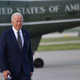 US President Joe Biden looks on after landing at Chicago O’Hare International Airport in Chicago, Illinois, on May 11, 2022, after addressing the International Brotherhood of Electrical Workers International Convention.